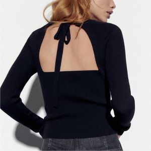 NWT BLACK KNIT SWEATER WITH OPEN BACK.